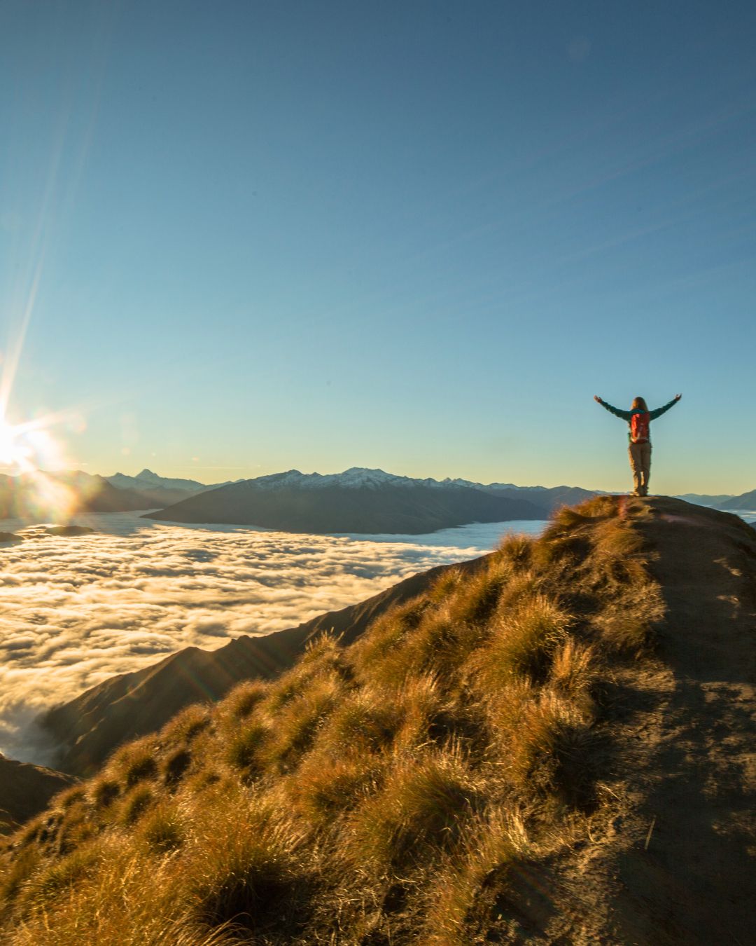 Happy client on adventure tour — client success training plan for adventure tour operators